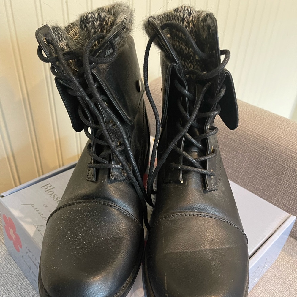 Black small heel boots. Lace up ankle. US size 8.5. Worn once
